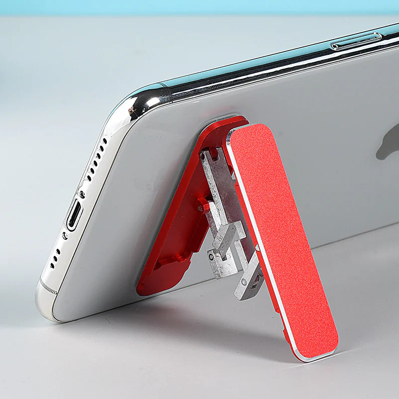 Ultra-slim aluminum folding phone stand in use, showcasing its adjustable support for smartphones.