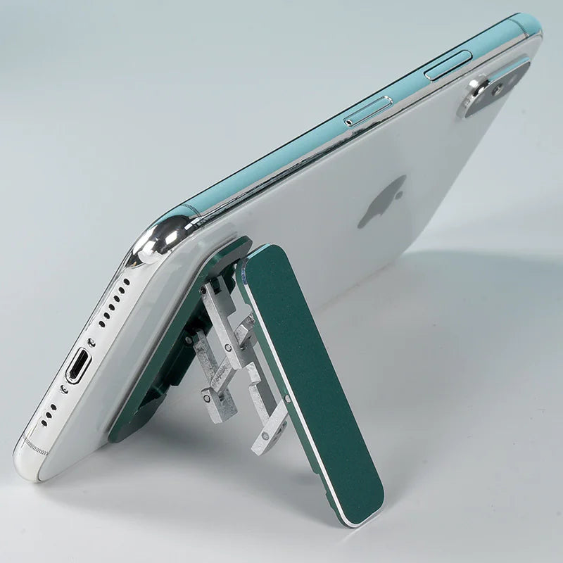 Ultra-slim aluminum folding phone stand in use with a smartphone, showcasing its adjustable and portable design.